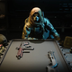 Farah observes her loadout.